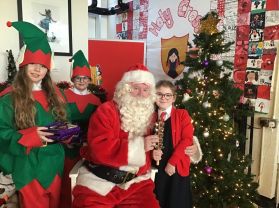 Santa visits Holy Cross Girls’ Primary School