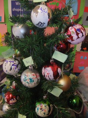 Primary One make personalised christmas decorations.